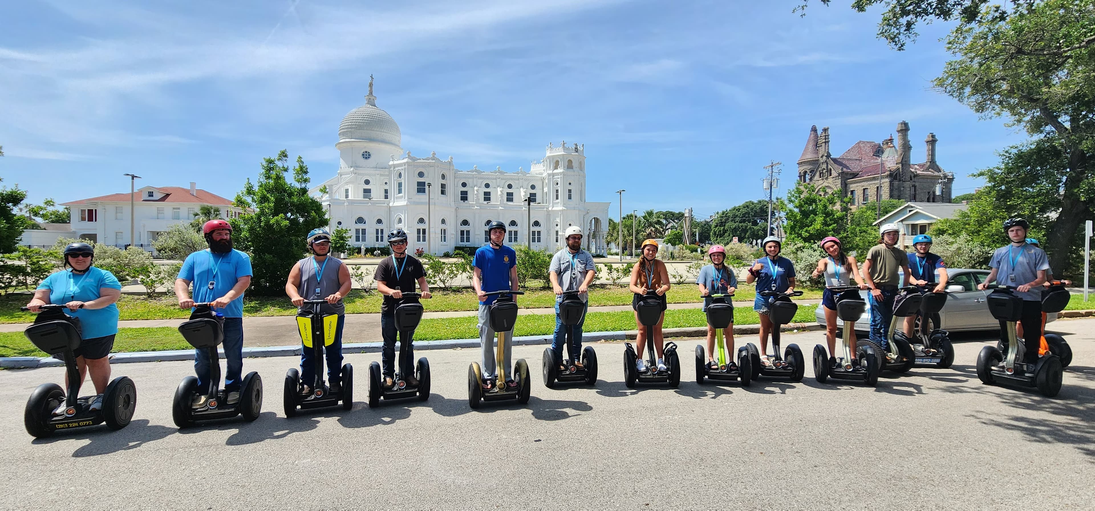 Tourists admiring Galveston tree carvings