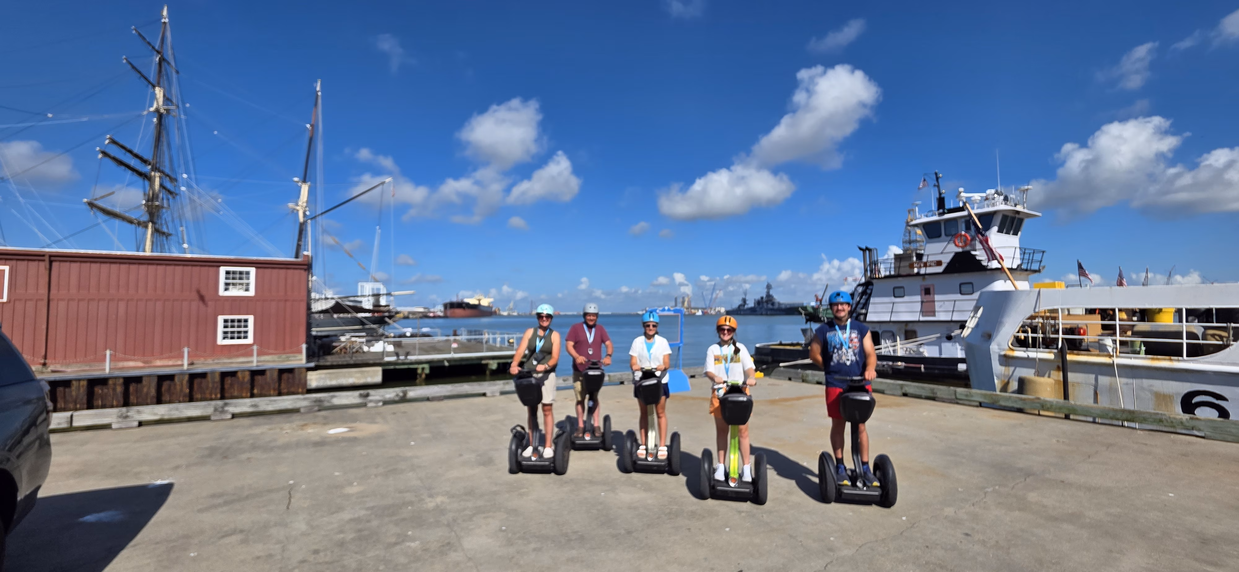 Tourists exploring Galveston on Segways